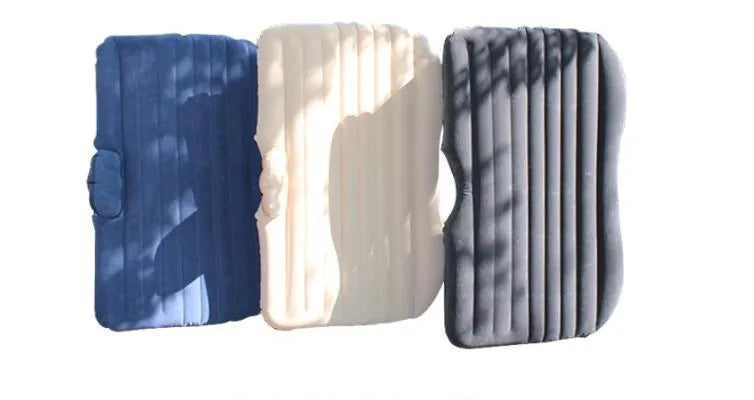 Ultra-thickened flocking cloth inflatable bed set up on a car rear seat with two pillows.