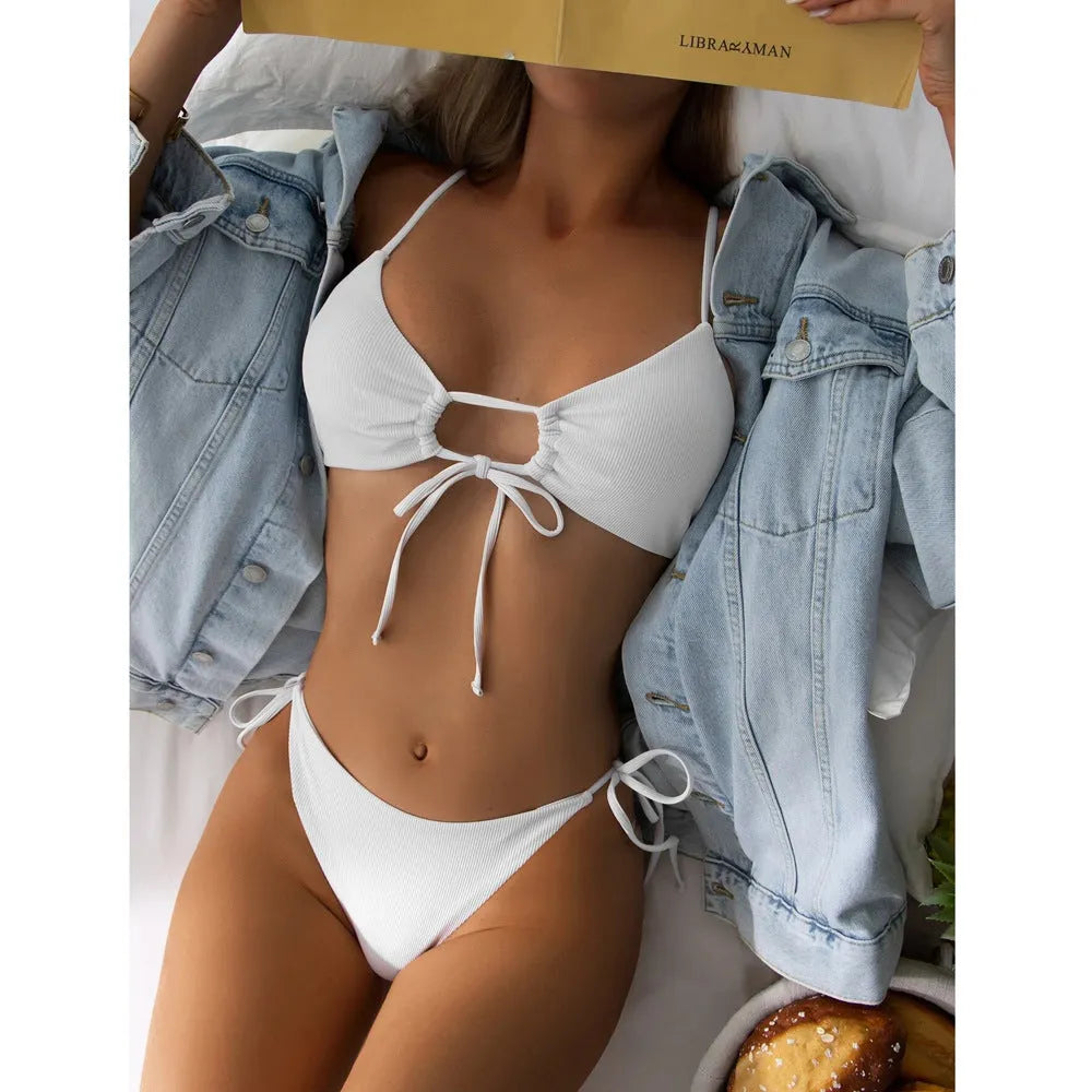 Women's solid colour drawstring bikini swimsuit in army green on a neutral background.