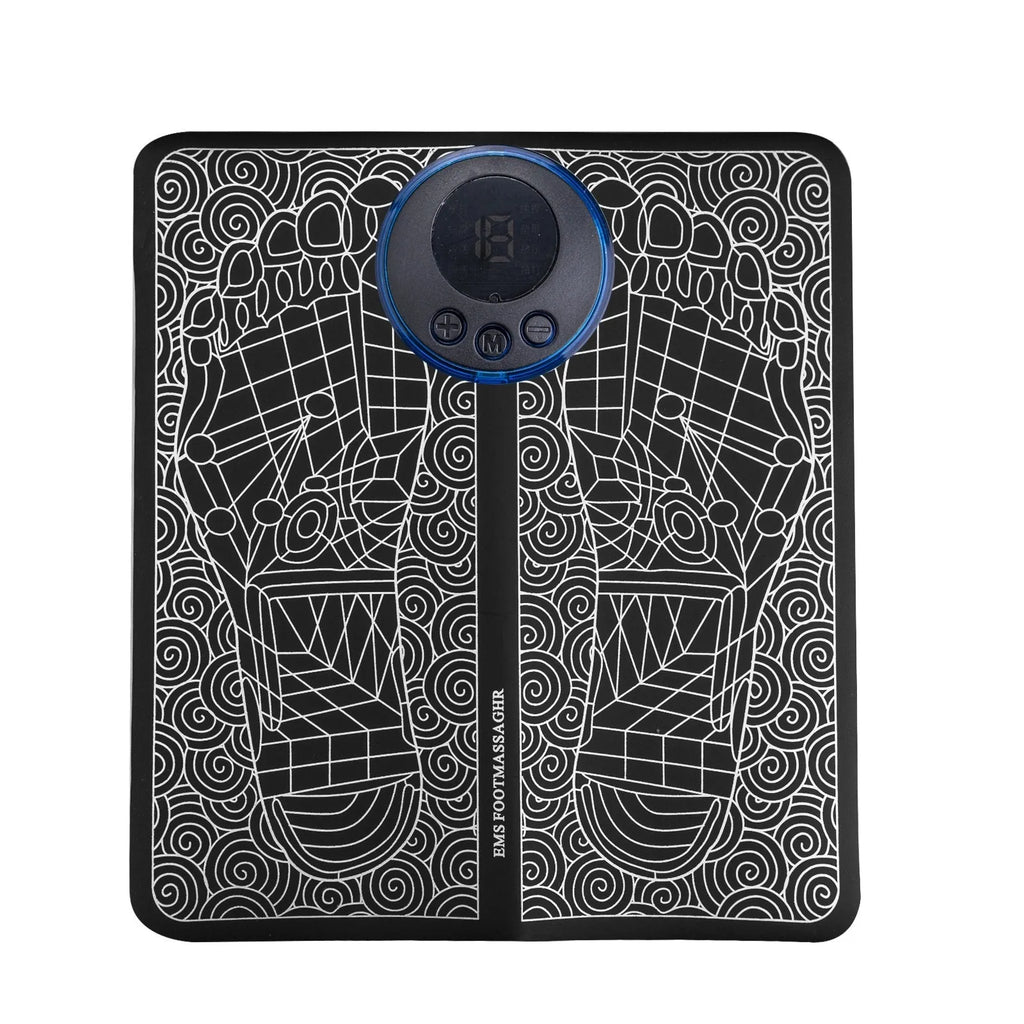 Leather foot massage cushion with wireless remote control and LCD screen on a wooden floor.