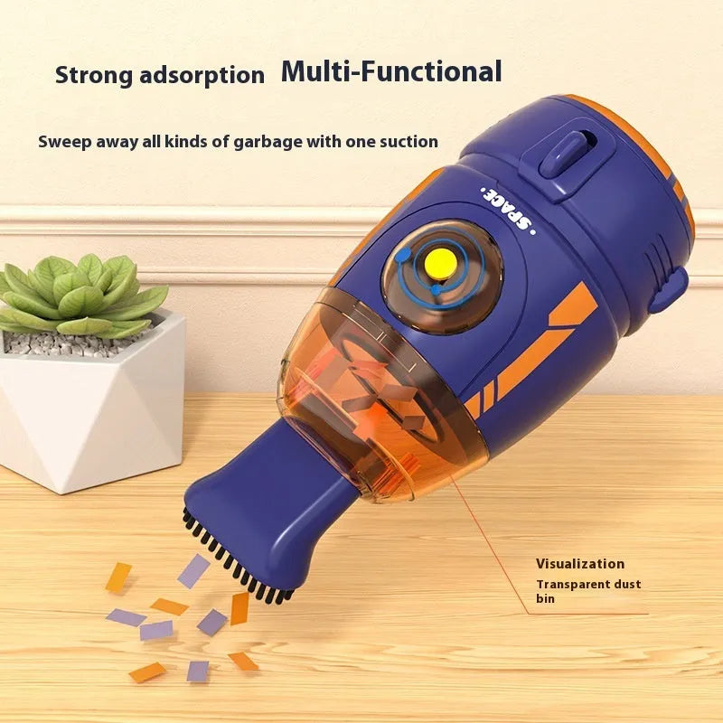 USB rechargeable handheld desktop vacuum cleaner in blue rocket design on a wooden desk