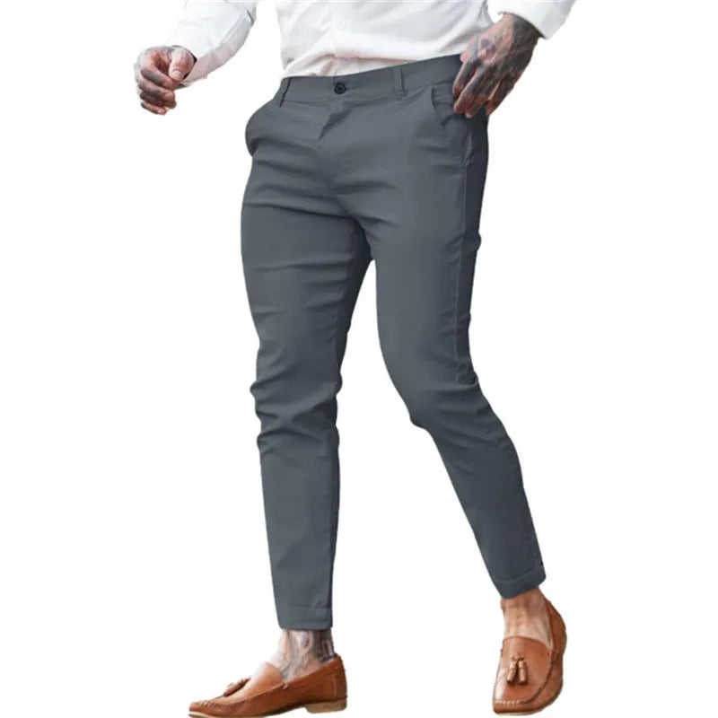 Men's slim fit cotton twill pencil trousers in various solid colours showing stretch fabric and zip fly detail