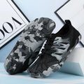Quick-drying mesh wading outdoor beach shoes with lace-up front and rubber sole.