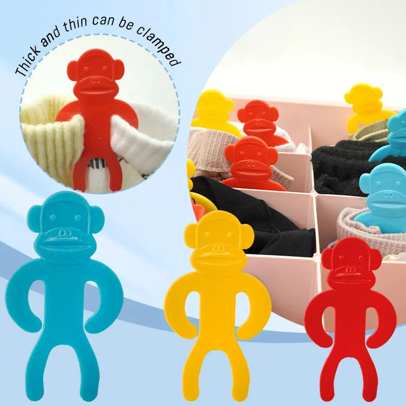 Blue, yellow, and red plastic socks clips for washing machine laundry organisation