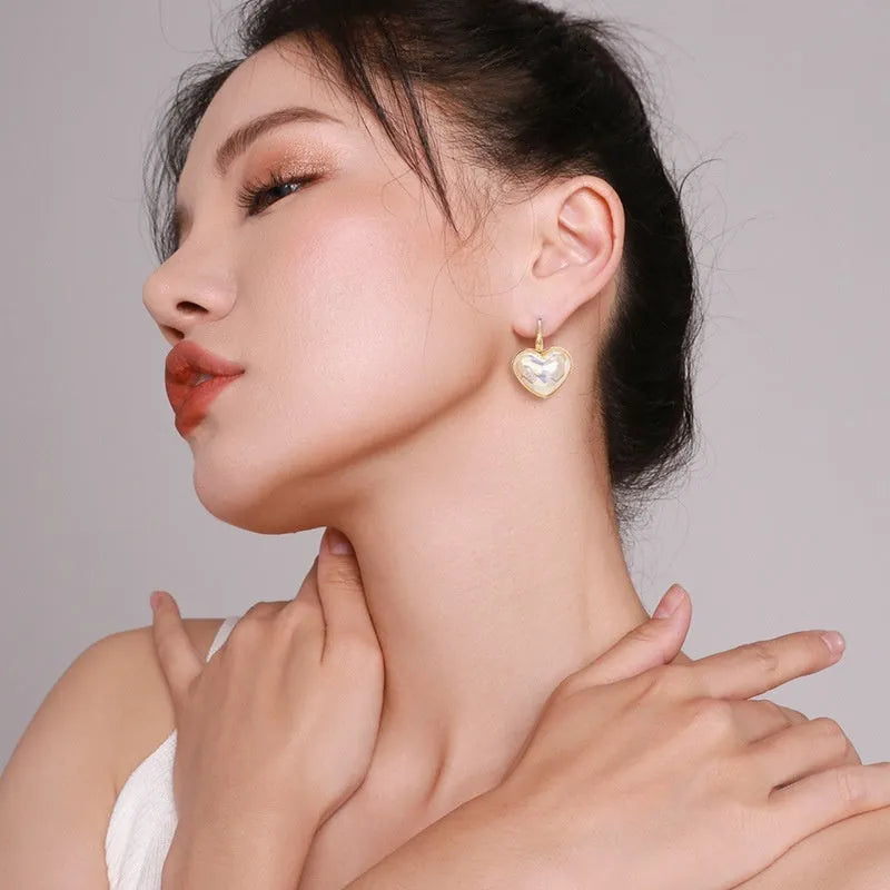 Gold-coloured alloy clip-on earrings with natural style design and metal decorative elements for women
