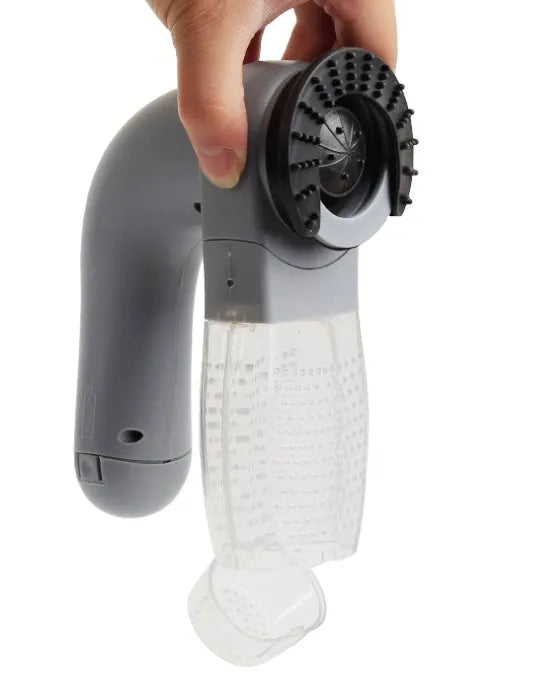 Grey portable electric pet hair vacuum cleaner with soft rubber brush head.