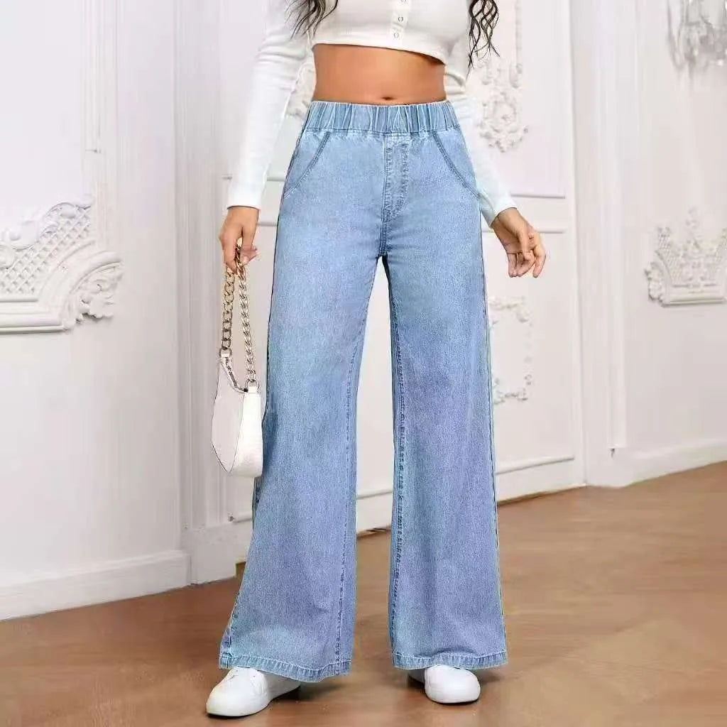 Light blue washed wide-leg plus size jeans with straight-leg design and zip fly