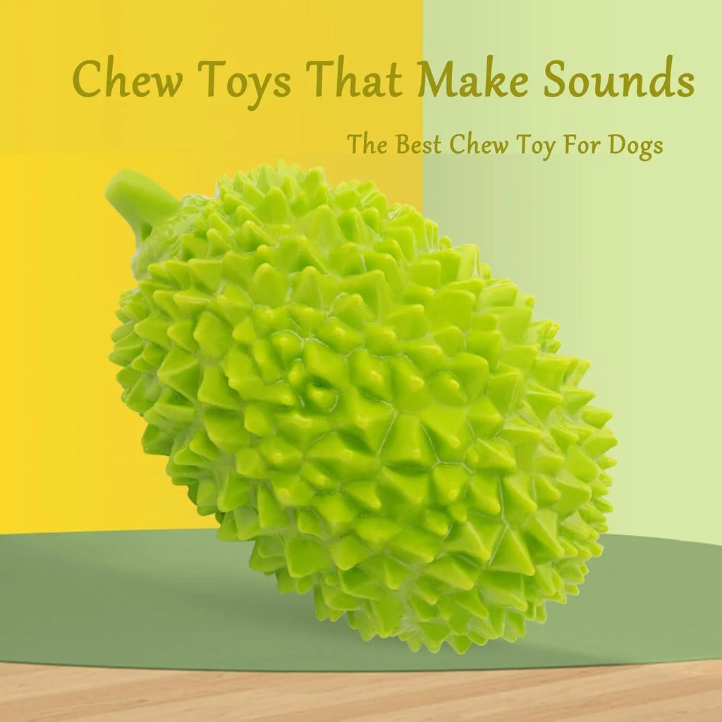 Durian-shaped milk-flavoured dog chew toy in beige with raised bumps for teeth cleaning and a bonus ball
