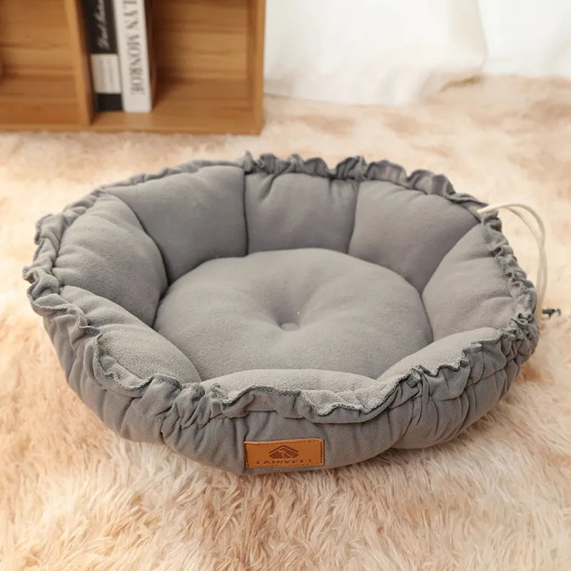 Grey and green reversible donut cat bed shown flat and in raised donut shape