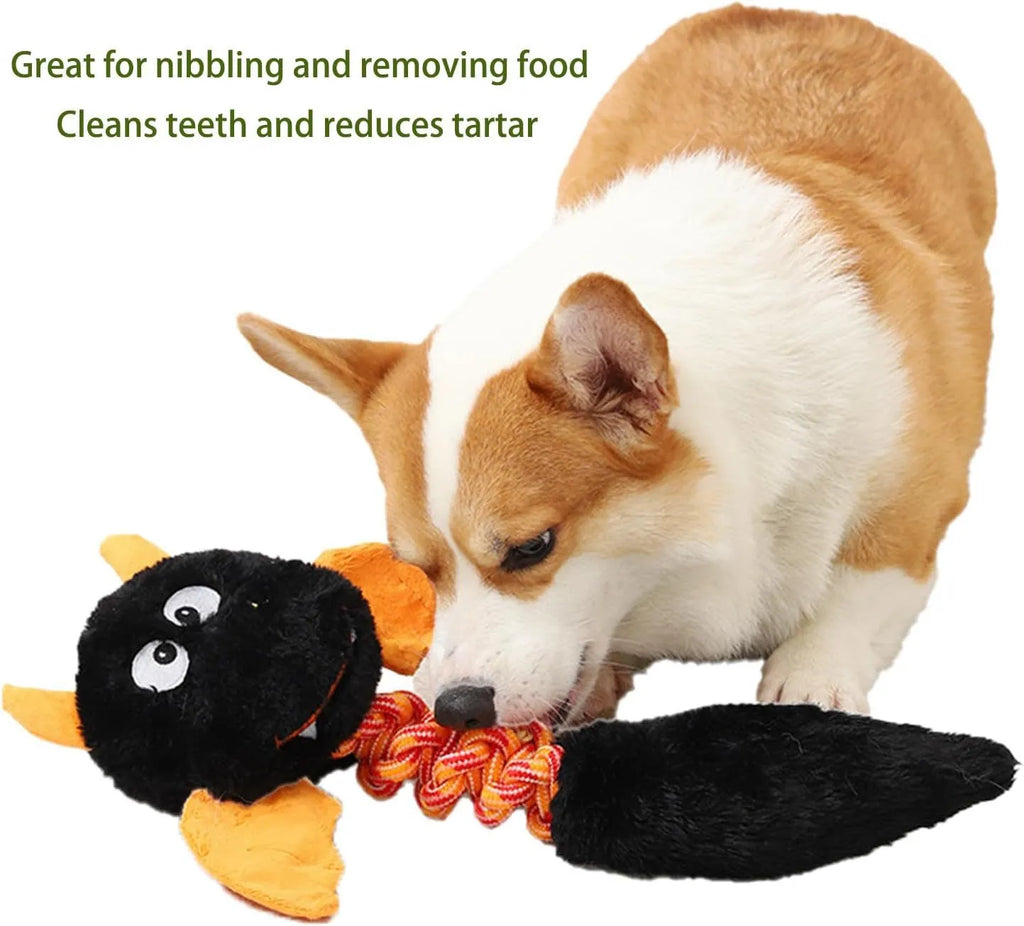 Large black plush dog toy with cartoon shape, rope knot, and squeaker for aggressive chewers.