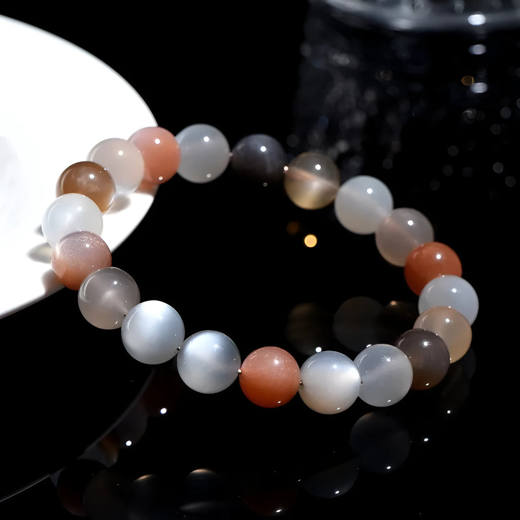Natural moonstone bracelet with colourful light variation showing 8mm beads in single circle configuration