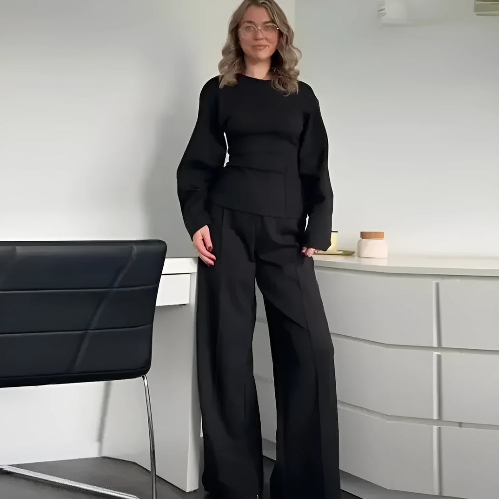 Women's polar fleece suit set showing O-neck pleated top with long sleeves and matching wide leg trousers