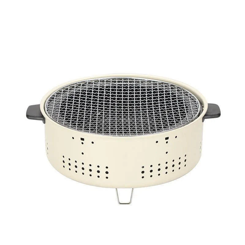Modern portable charcoal stove with grill rack disk for indoor tea cooking and baking.