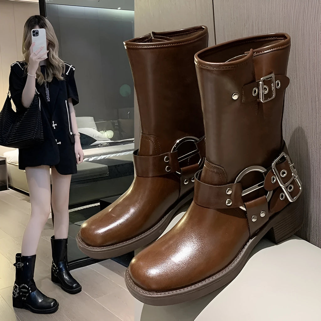 Women's platform boots with mid-calf length and belt buckle detail in black or brown colours