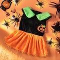 Halloween pet costume: orange pumpkin skirt and black Halloween sweater for small dogs and cats on hangers.
