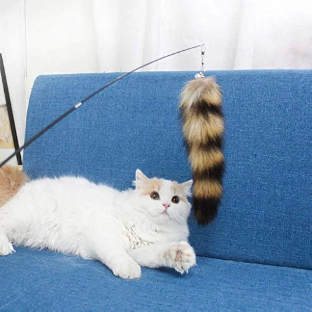 Black cat toy wand with feather attachment and elastic string for interactive play
