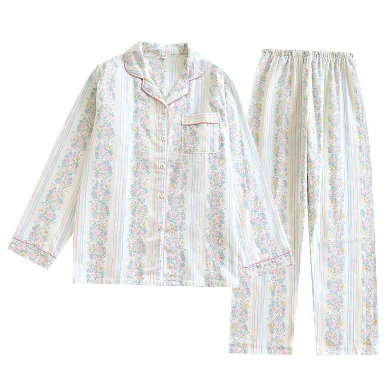 Women's cotton gauze long-sleeved pyjama set with trousers in a striped or small fruit print pattern.