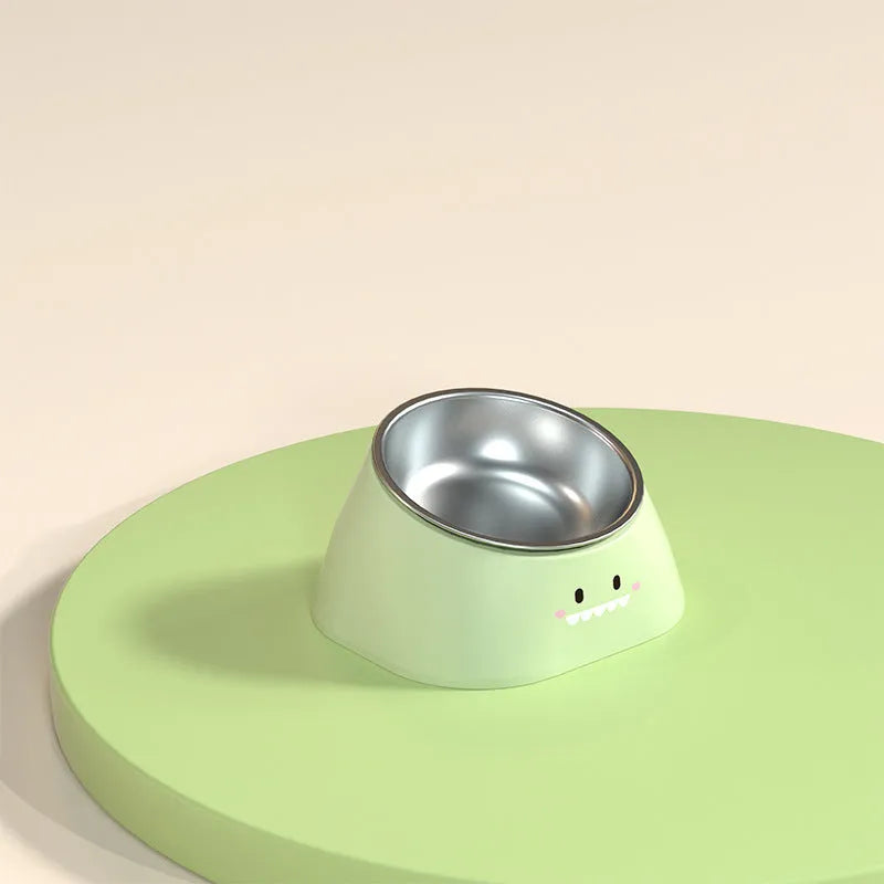 Green tilted stainless steel pet bowl showing 15-degree feeding angle