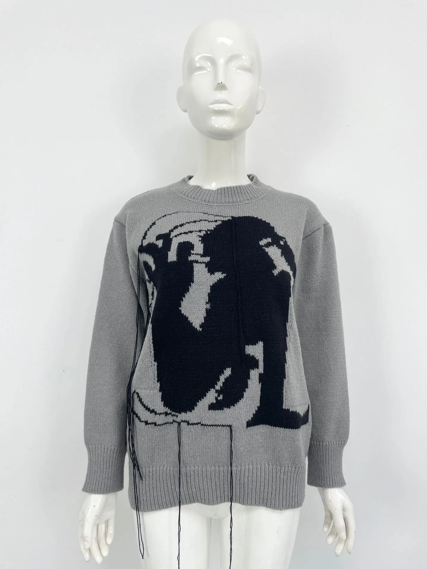 Women's grey alpaca wool sweater with tassel detailing and loose fit