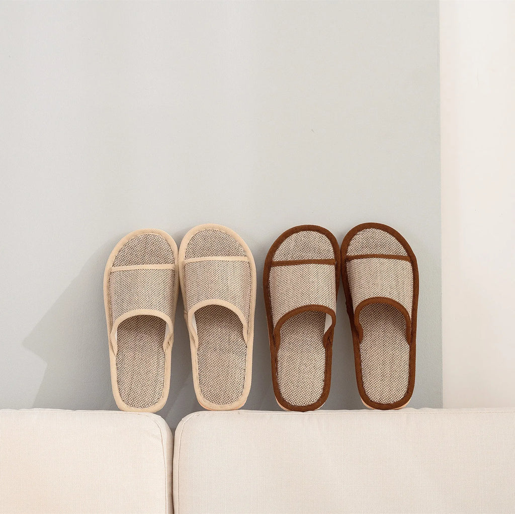 Women's open-toe linen slipper in a light brown colour, showing the breathable design and thickening sole.