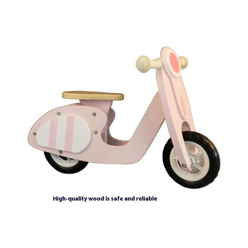 Pink wooden toddler balance scooter on a 10-inch wooden frame for children aged 1-6.