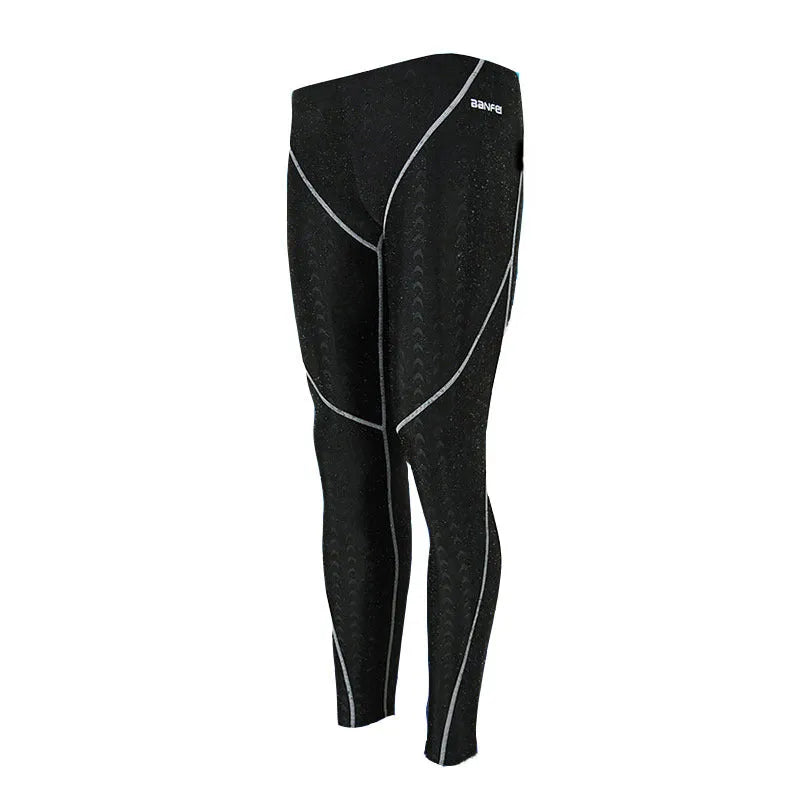 Men's nylon cropped swimming trunks in black with coloured lines suitable for swimming and cycling