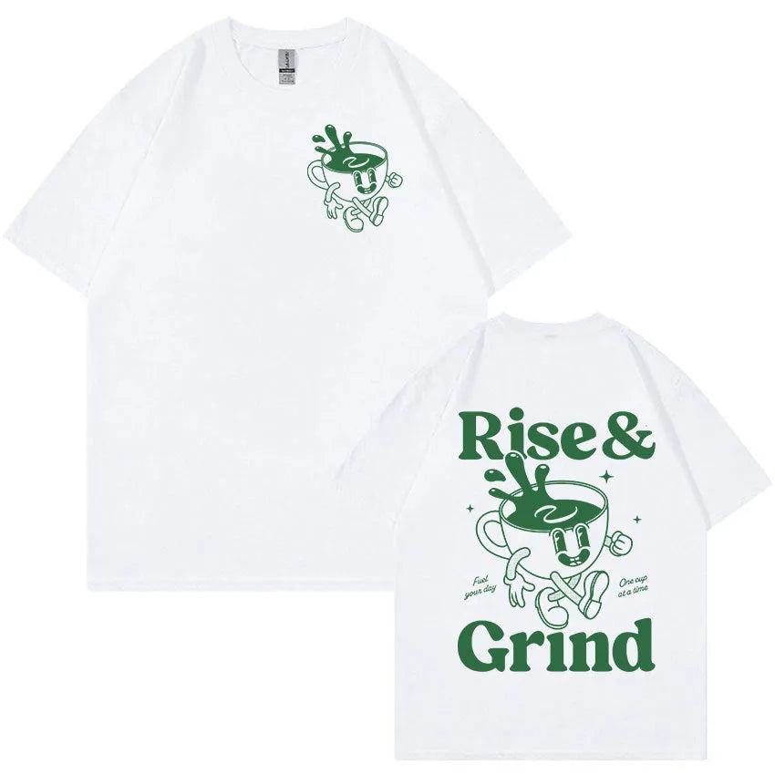 Man wearing a black loose-fit t-shirt with a green 'Rise And Grind' coffee cartoon graphic on the front.