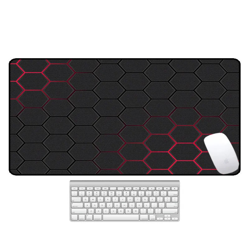 Large desk pad mouse mat with patterned design and non-slip natural rubber base on a wooden desk.