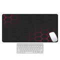 Large desk pad mouse mat with patterned design and non-slip natural rubber base on a wooden desk.
