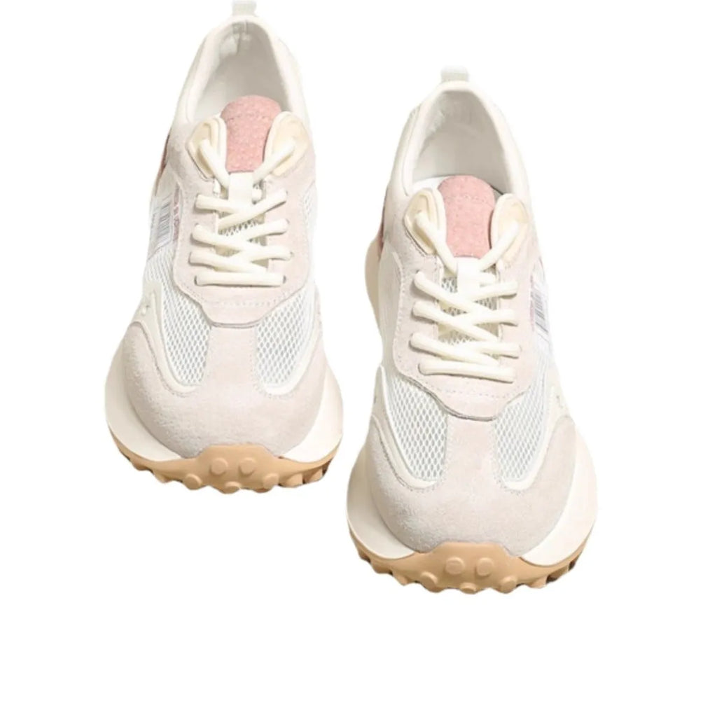 Women's grey and pink low-top retro sneakers with a round toe and flat rubber sole.