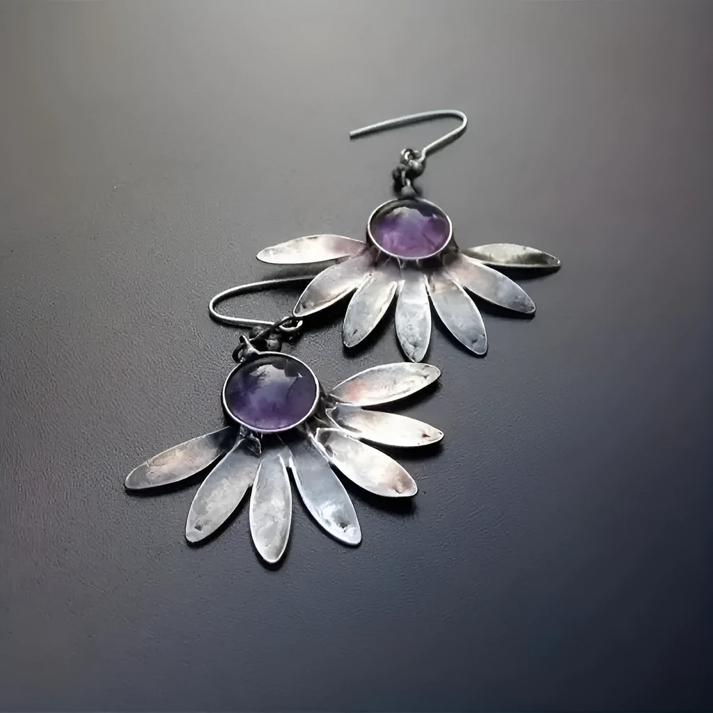 Purple resin bohemian style earrings with floral design and animal zodiac modelling