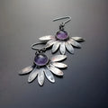 Purple resin bohemian style earrings with floral design and animal zodiac modelling