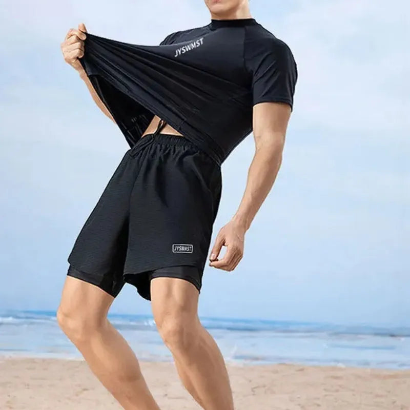 Men's plus size two-piece swim set with vest and trunks in polyester fabric.