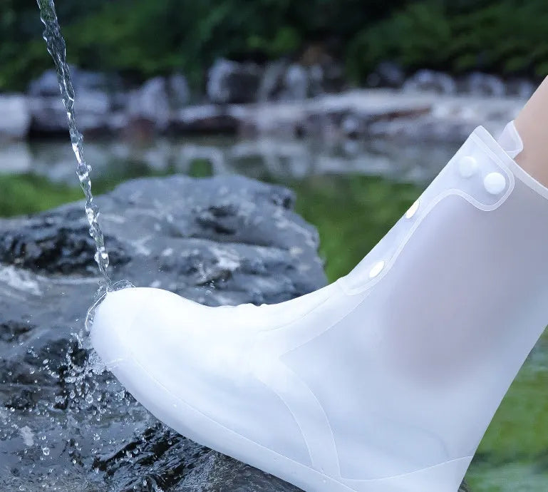 White PVC high top reusable waterproof shoe covers for women showing size options and water resistant design