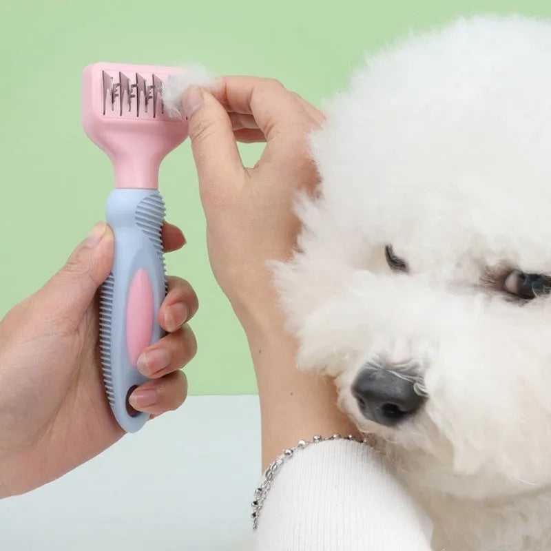 Pink and purple pet grooming comb with stainless steel knot knife and brush heads.