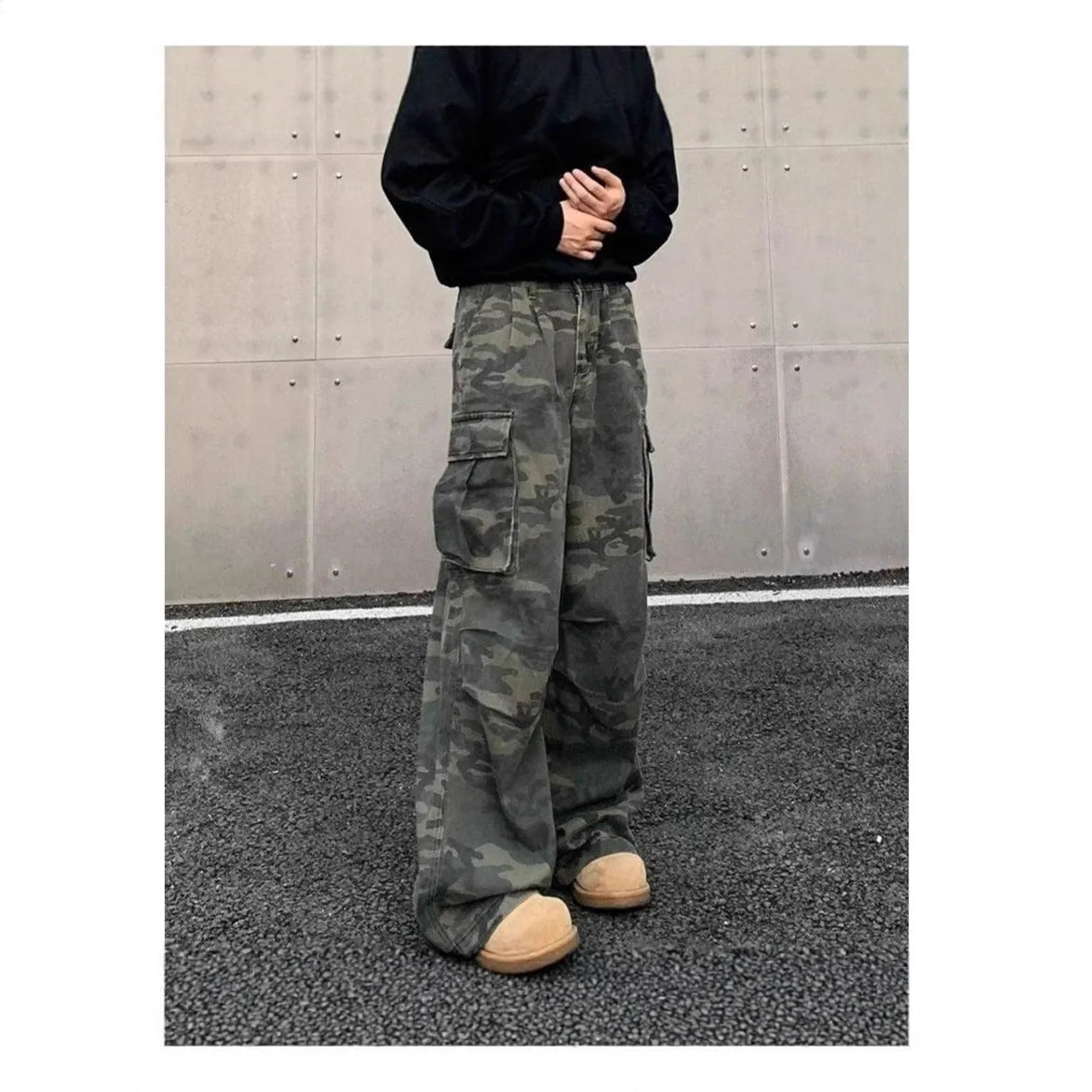 American vintage washed camouflage cotton blend cargo trousers with multiple pockets on a mid-rise waist.