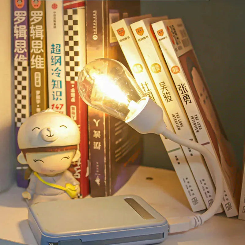 USB rechargeable folding night light with tungsten filament LED bulb in folded and unfolded positions