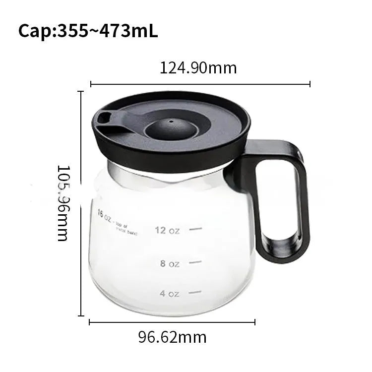 Transparent borosilicate glass coffee maker with a black silicone cover on a wooden table.