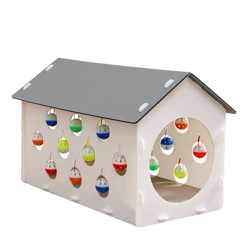 Plastic integrated cat scratch board with attached nest bed and tunnel containing a bell ball toy.