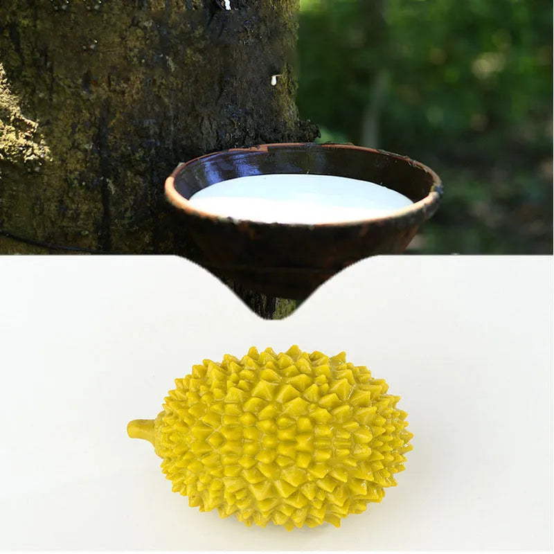 Durian-shaped milk-flavoured dog chew toy in beige with raised bumps for teeth cleaning and a bonus ball