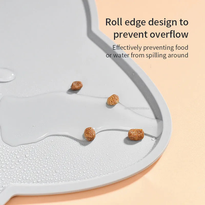 Cat head shaped silicone pet feeding mat in solid colour measuring 44 by 24 centimetres