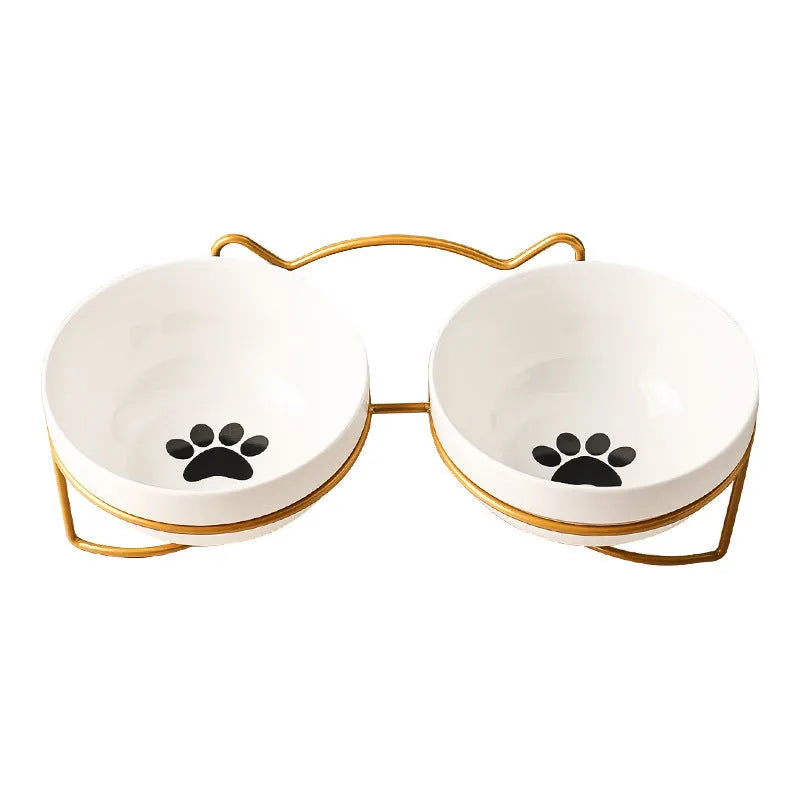 White ceramic cat bowl with iron frame in cat footprints design