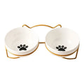 White ceramic cat bowl with iron frame in cat footprints design