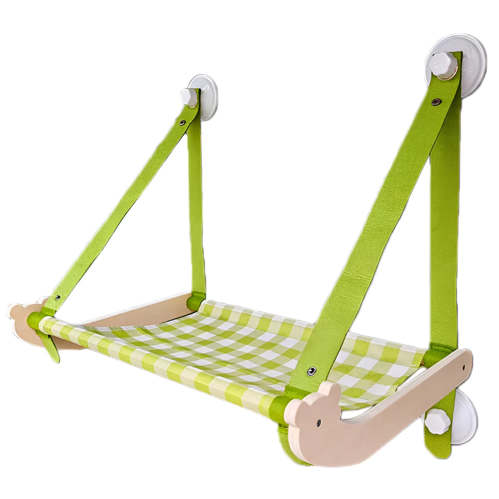 Pink wooden cat hammock bed with suction cups attached to a window