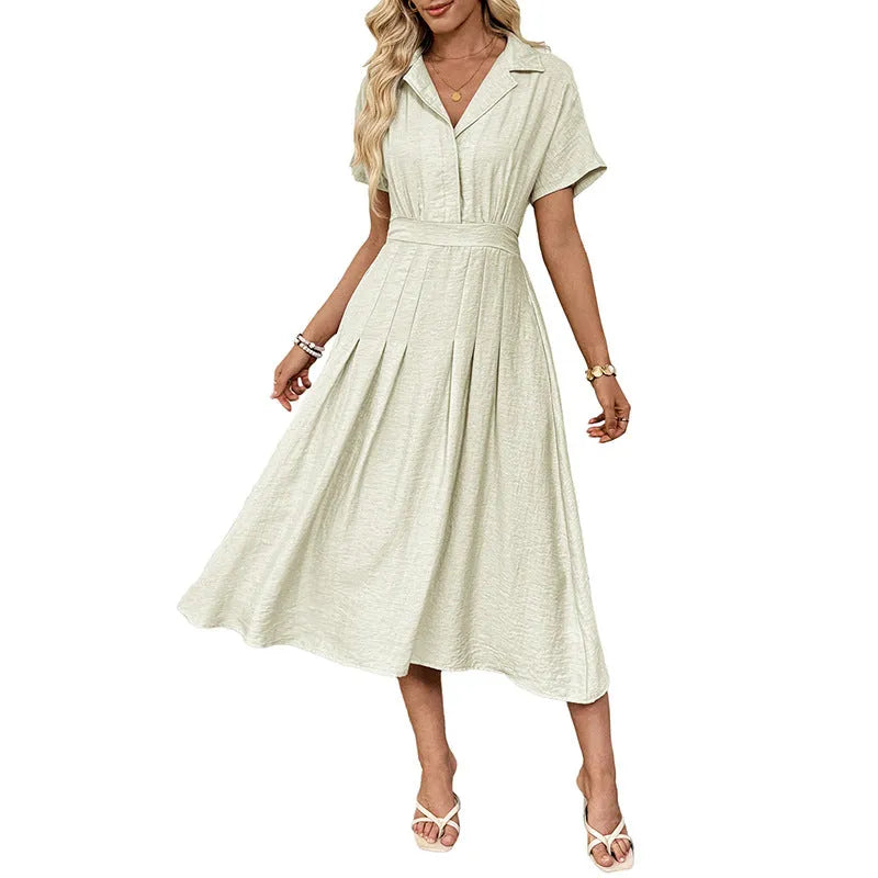 Light green women's shirt dress with lapel collar, waist tie, and hidden skirt pockets on a hanger.