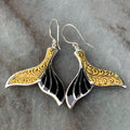 Women's white gold fishtail earrings with whale design elements in retro style