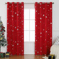 Red snowflake pattern shade cloth curtain with lace loop detailing hung on window
