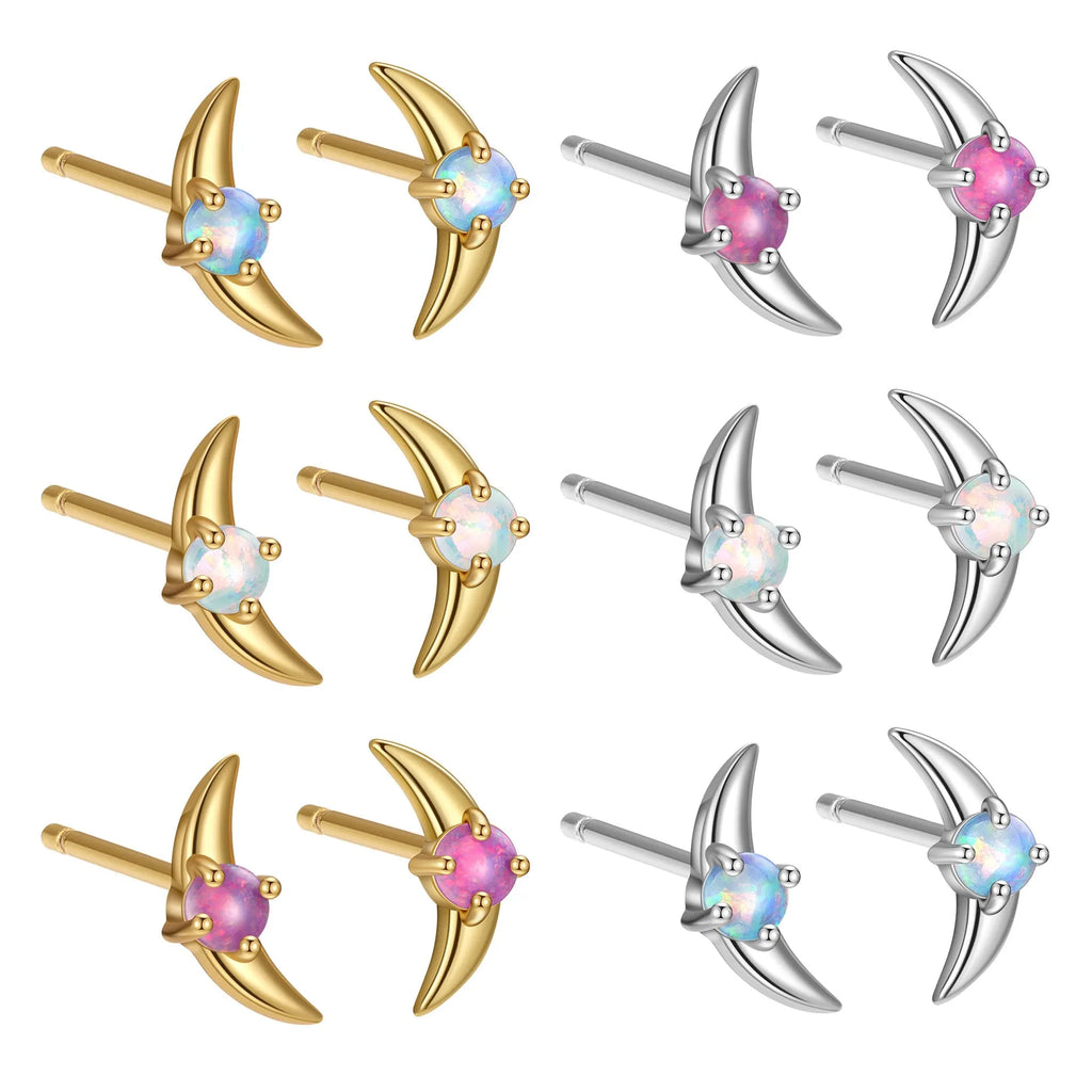 A pair of women's geometric drop earrings made from 925 sterling silver with coloured stones, shown in a gold tone finish.