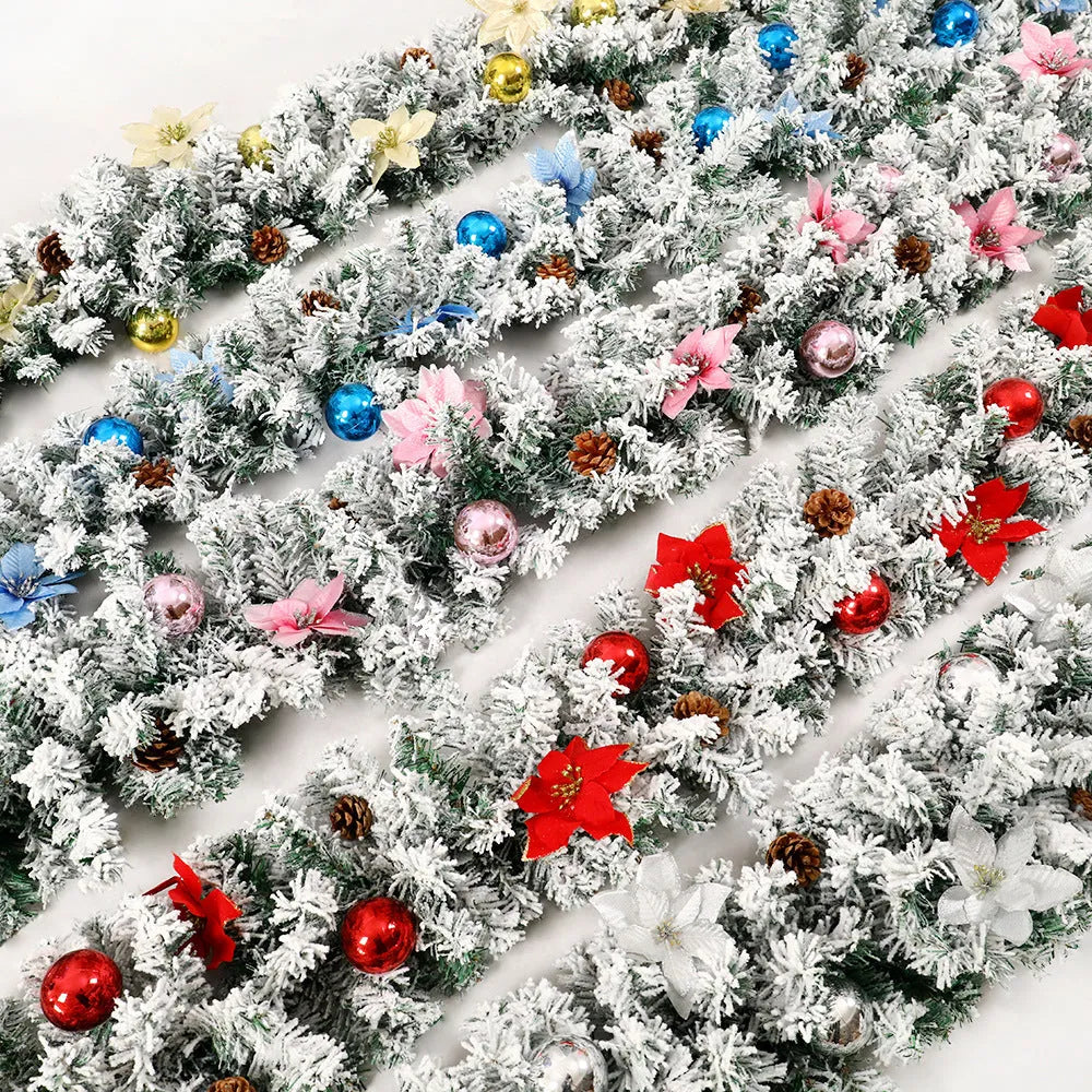 American-style flocked rattan Christmas garland in red, draped over a mantelpiece.