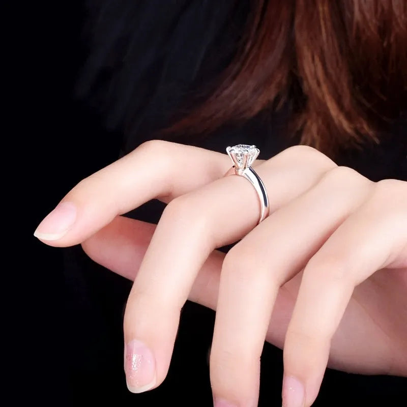 Six-claw inlaid zircon ring in white copper with electroplated white gold finish, geometric shape, unisex sizes No 4 to No 11.