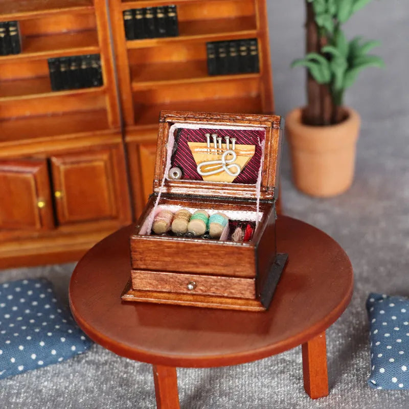 Miniature wooden sewing machine ornament with European-style design on display